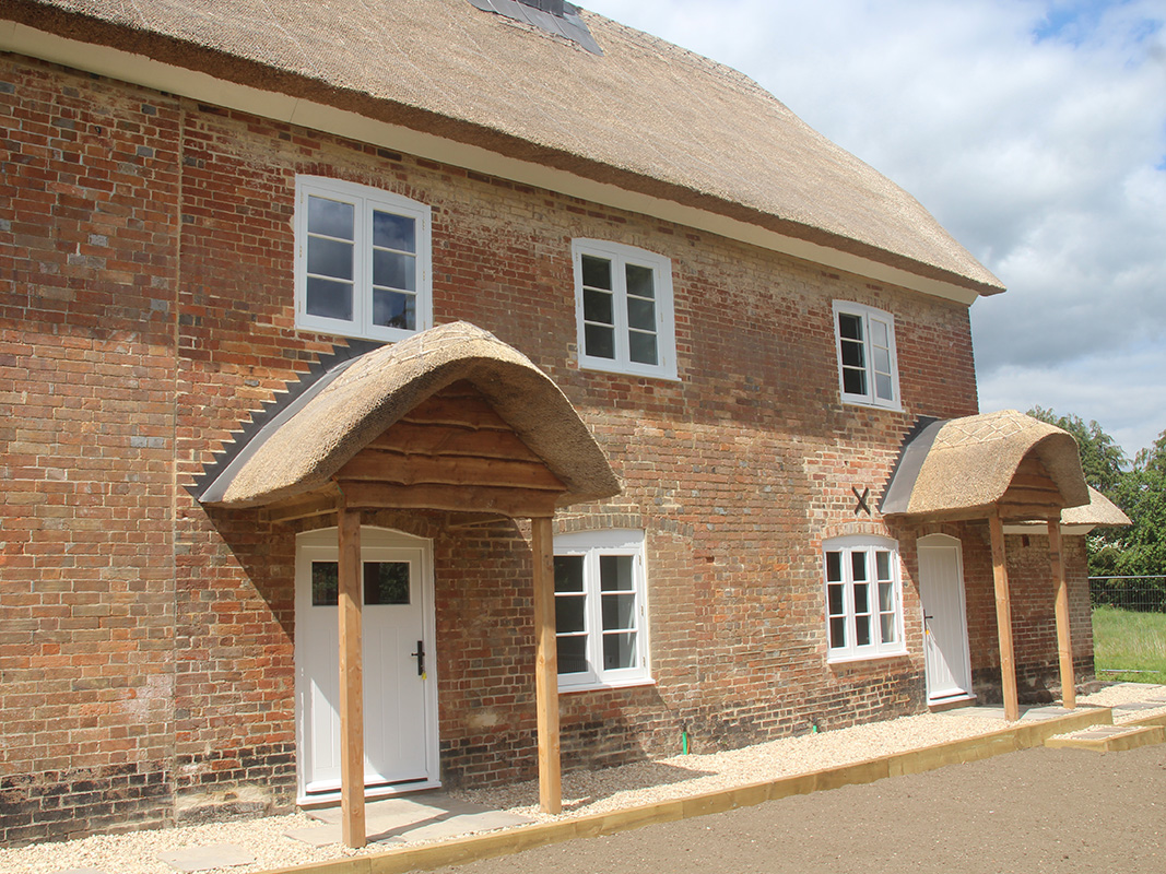 Dairy Cottage - Thatched porch - Spetisbury Construction